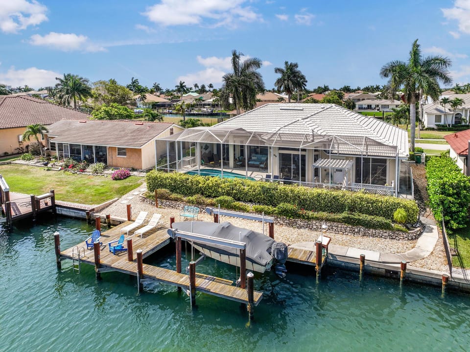House, Multiple Beds (Stylish waterfront home with pool and) | Exterior