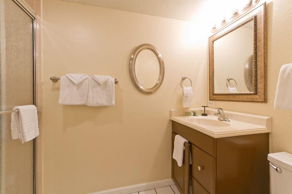 Full bathroom featuring a walk-in shower.