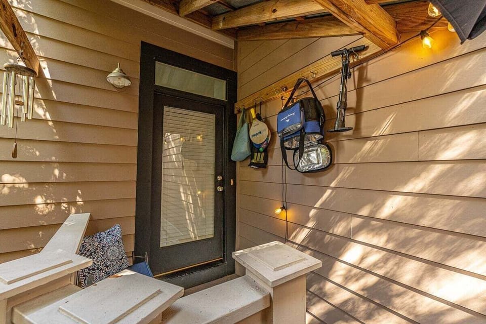 Patio entryway with dark wood door