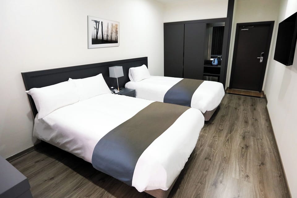 Triple Room (Hotel Type) | Blackout drapes, soundproofing, free WiFi, bed sheets