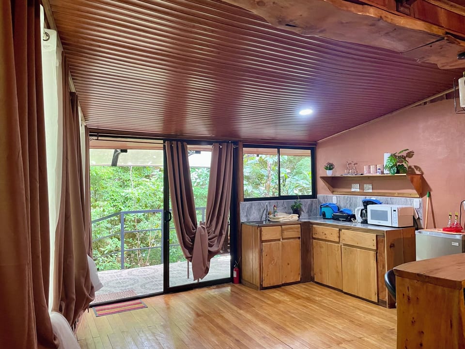 Family Cabin, 1 Bedroom, Balcony, Garden View | Private kitchen | Fridge, microwave, coffee/tea maker, electric kettle