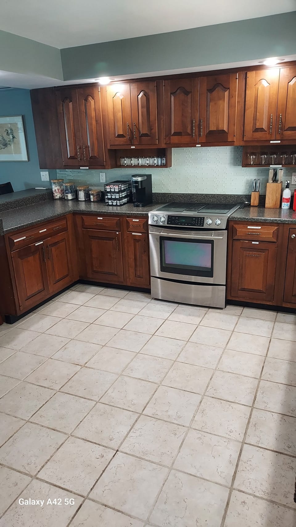 Kitchen view (but without moveable island shown). Counter seating area at left.