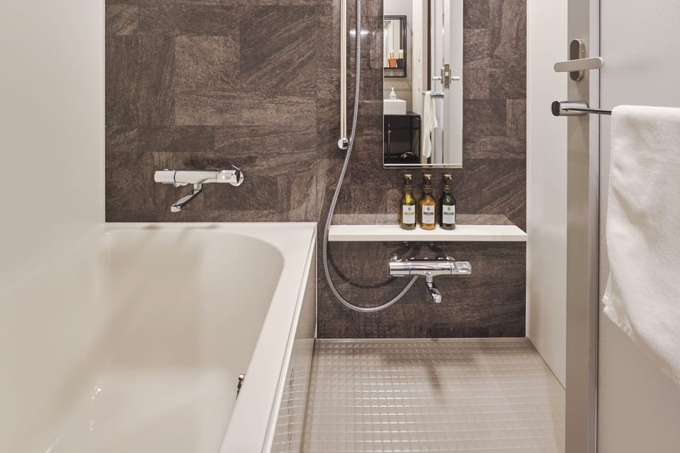 Japanese Western Room | Bathroom | Combined shower/tub, deep soaking tub, free toiletries, hair dryer