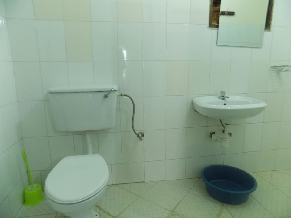 Shower, rainfall showerhead, slippers, towels