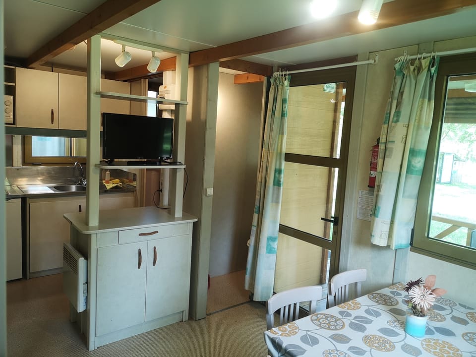 Bungalow, 2 Bedrooms | Private kitchen | Fridge, microwave, stovetop, cookware/dishes/utensils