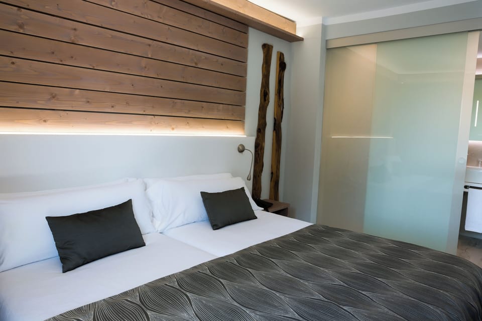 Blackout drapes, rollaway beds, WiFi, bed sheets