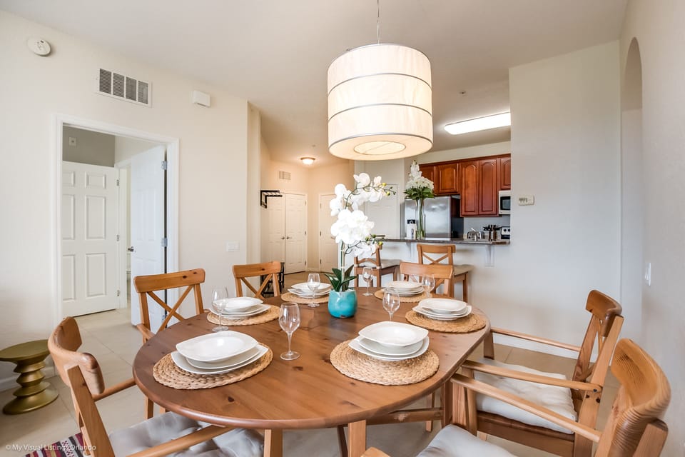 Dining in Style: Experience the epitome of elegance in our condo's dining area, adorned with sleek and sophisticated chairs for a luxurious dining experience