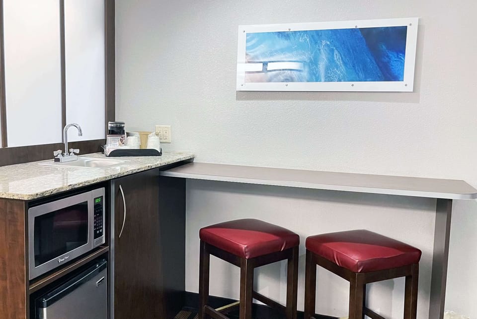 In-room safe, desk, iron/ironing board, free cribs/infant beds