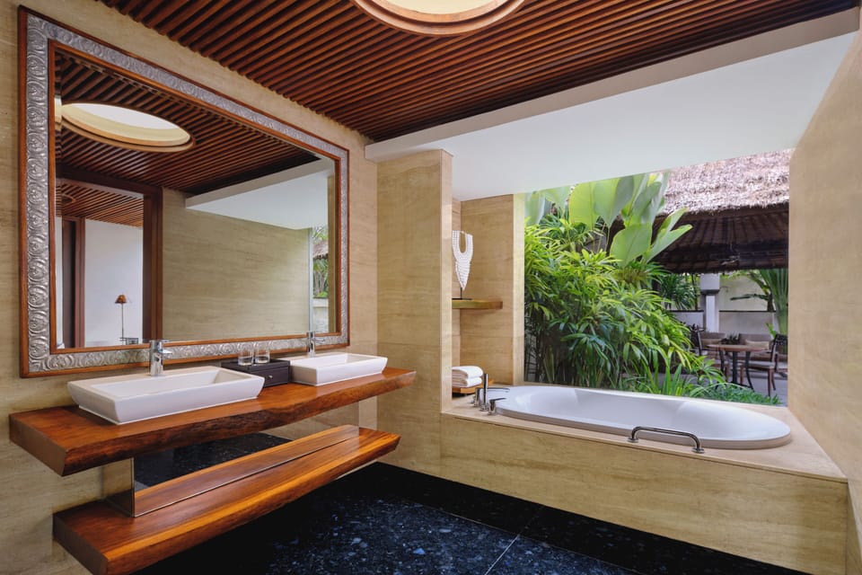 Separate tub and shower, jetted tub, free toiletries, hair dryer
