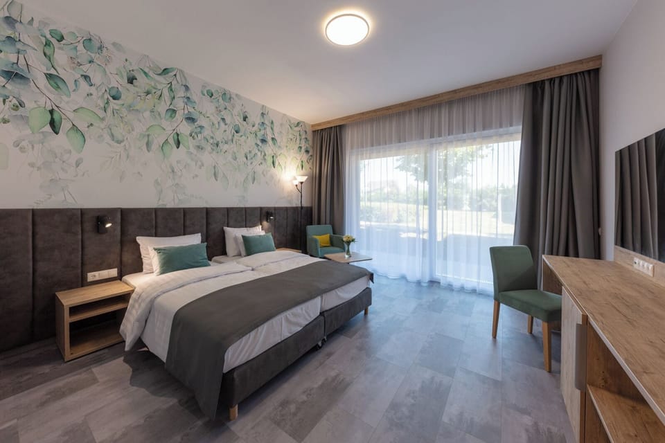 Superior Double Room | Minibar, in-room safe, desk, laptop workspace