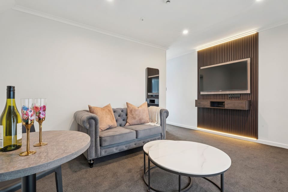 Luxury Room, 1 Bedroom | Living area | TV
