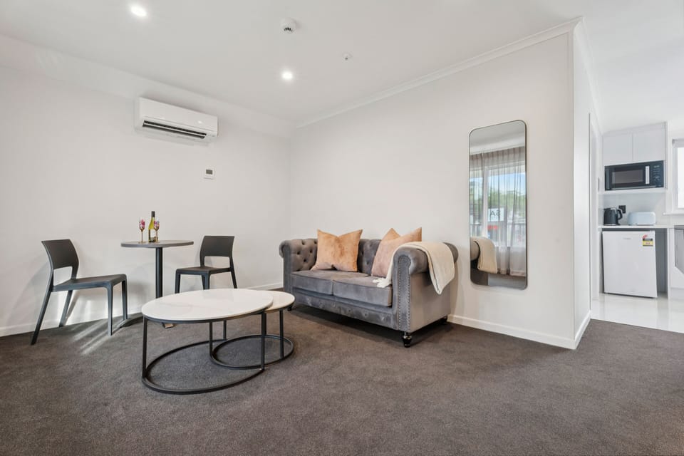 Luxury Room, 1 Bedroom | Living area | TV