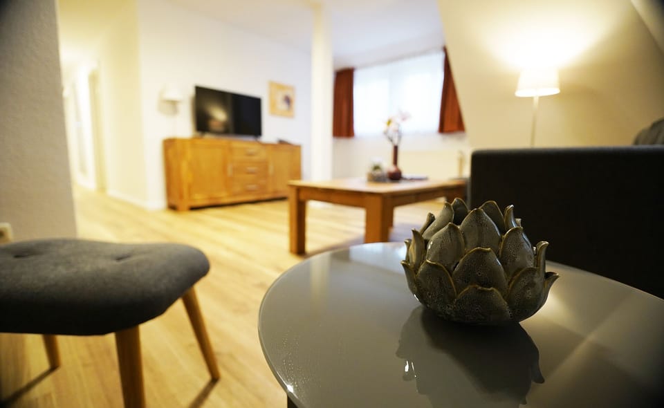 Triple Room | Living area | TV