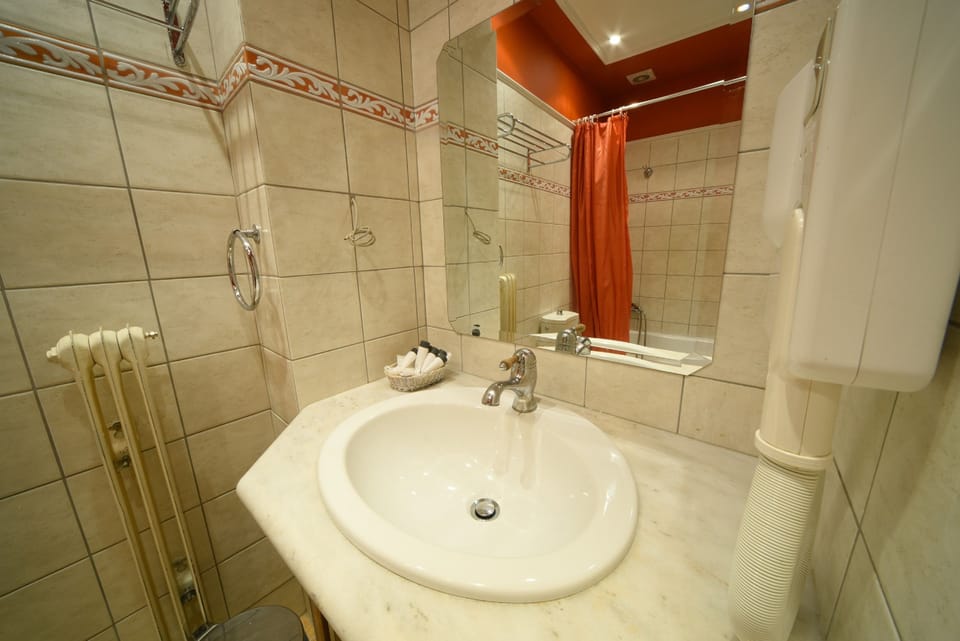 Family Suite, Village or Mountain View | Bathroom sink