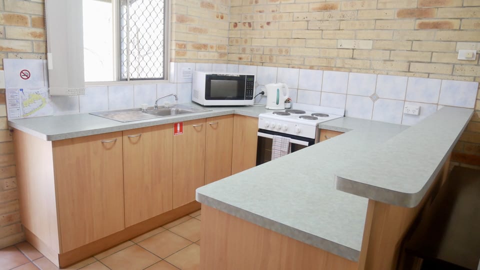 Family Apartment | Private kitchen | Coffee/tea maker, fridge, microwave, cookware/dishes/utensils