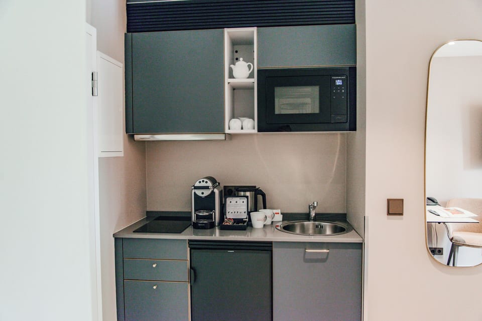 Deluxe Studio, 1 King Bed, Non Smoking, Garden View | Private kitchen | Full-size fridge, microwave, stovetop, espresso maker