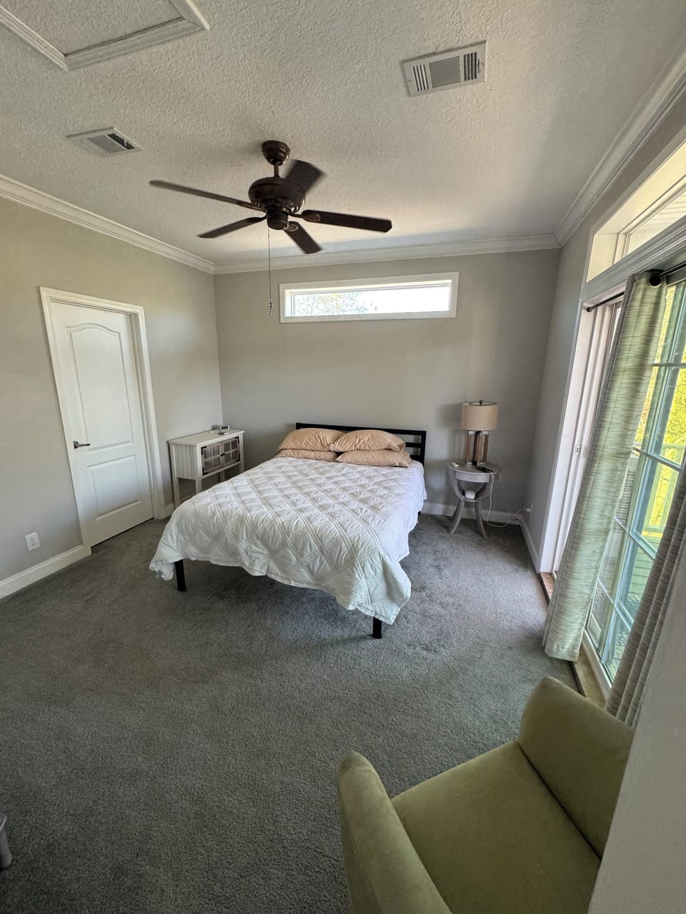 Bedroom # 1;  Queen sized bed;  Ensuite.  Back porch access.