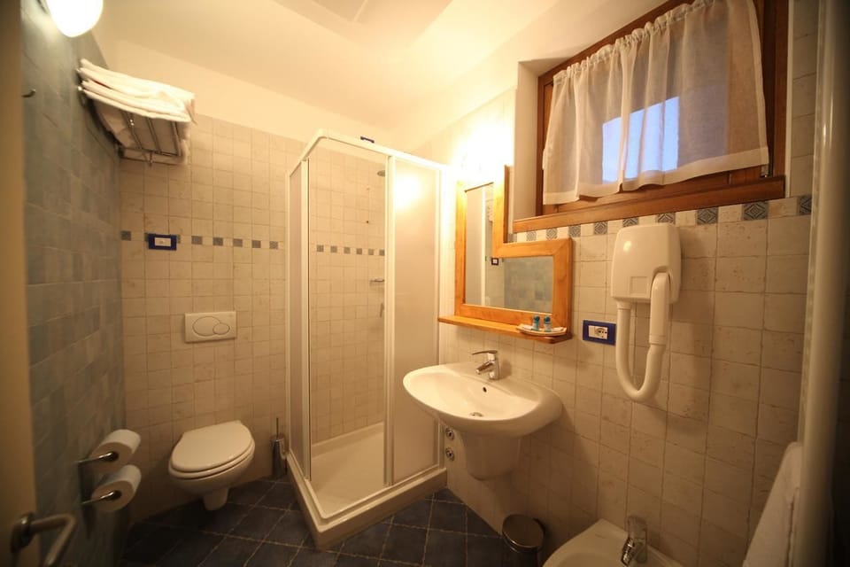 Shower, rainfall showerhead, towels