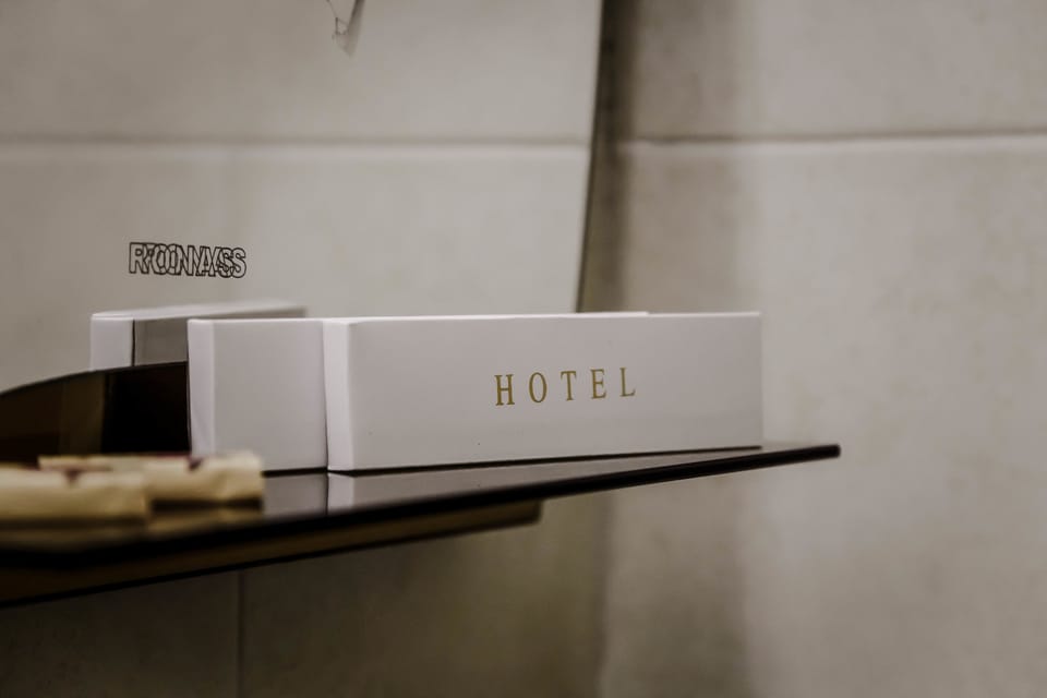 Standard Twin Room, 2 Twin Beds, Courtyard View | Bathroom amenities | Shower, hair dryer, towels