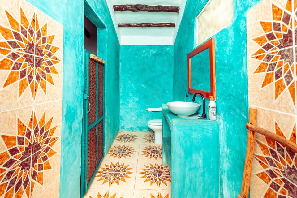 Family Bungalow | Bathroom | Shower, towels, soap, toilet paper