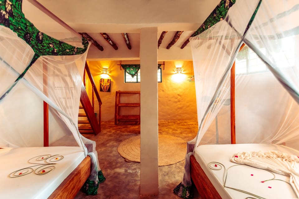 Family Bungalow | In-room safe, individually decorated, individually furnished, bed sheets