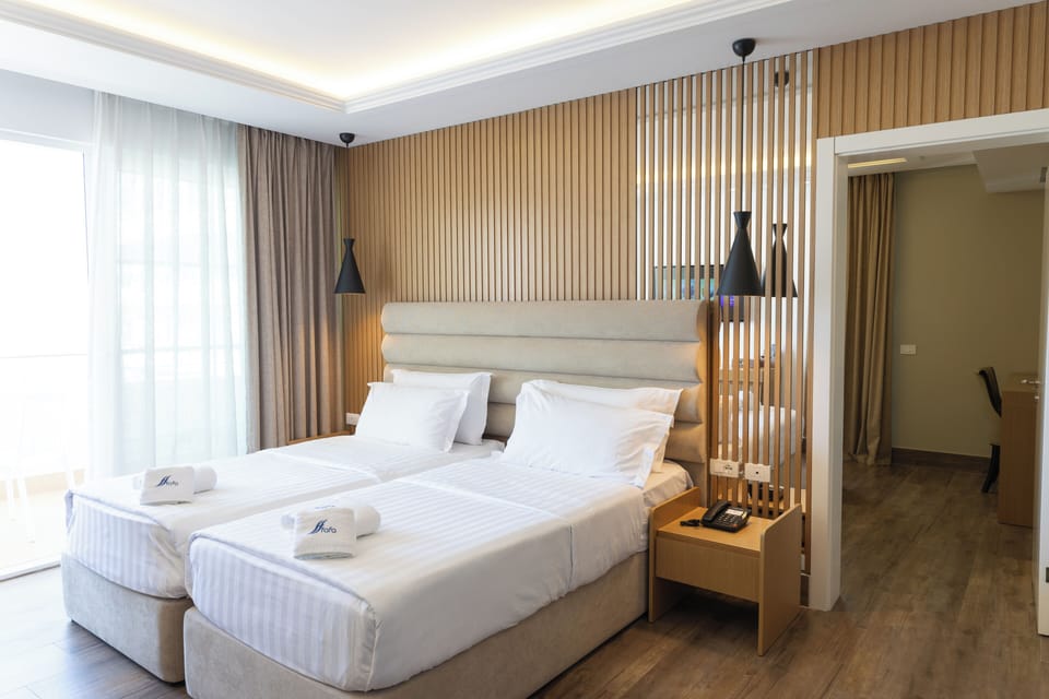 Frette Italian sheets, premium bedding, pillowtop beds, in-room safe