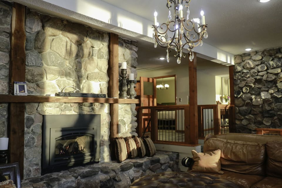 'The Great Gatsby' view of the stone fireplace.