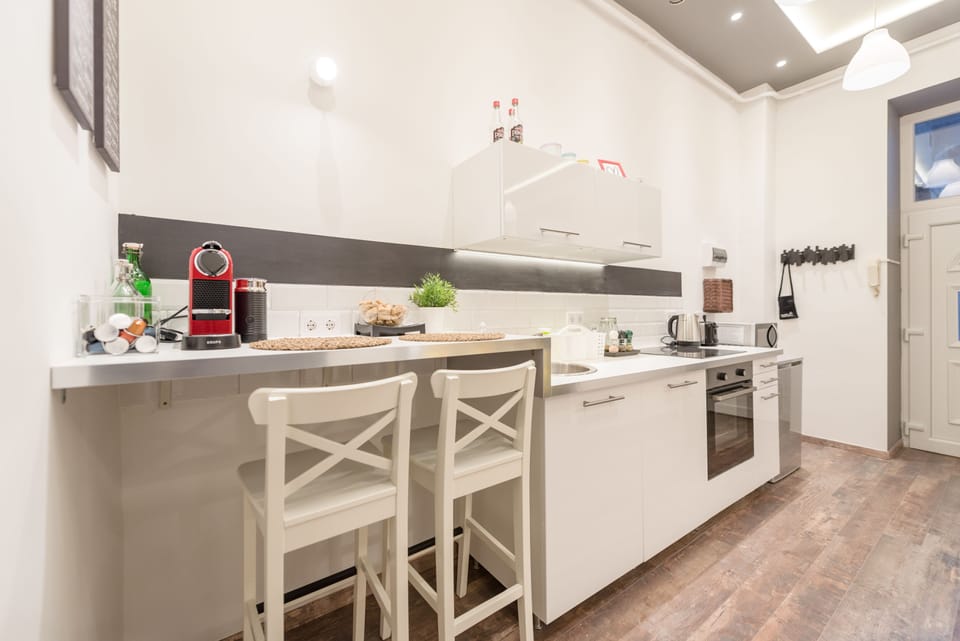 Apartment, 2 Bedrooms | Private kitchen | Fridge, microwave, oven, stovetop