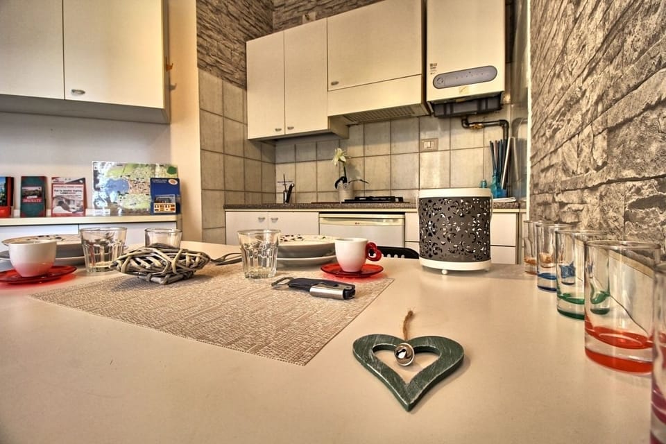 Studio, 1 Bedroom | Private kitchen | Full-size fridge, stovetop, cookware/dishes/utensils