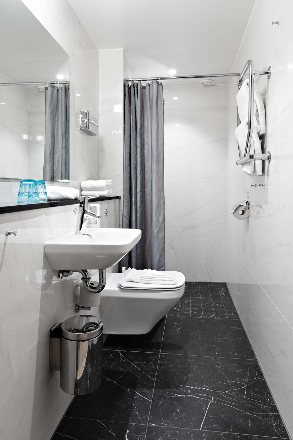 Hair dryer, heated floors, towels, soap