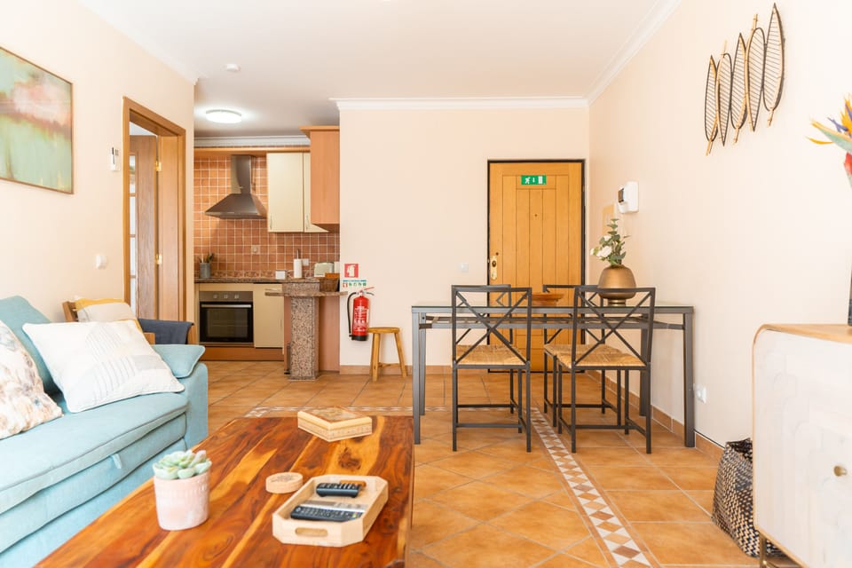 Apartment, 1 Bedroom, Balcony, Garden View | Living area | Flat-screen TV, DVD player, iPod dock