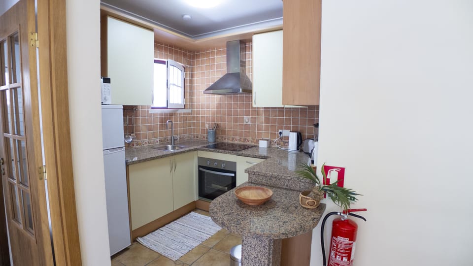Apartment, 1 Bedroom, Balcony, Garden View | Private kitchen | Full-size fridge, microwave, oven, stovetop