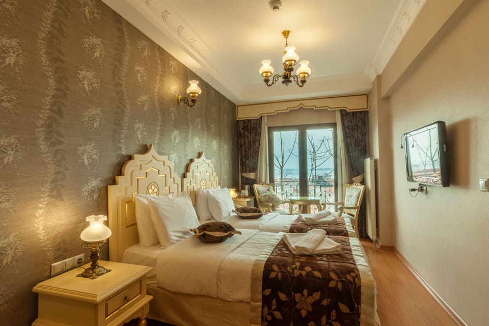 Superior Room, Sea View | Minibar, in-room safe, individually decorated, desk