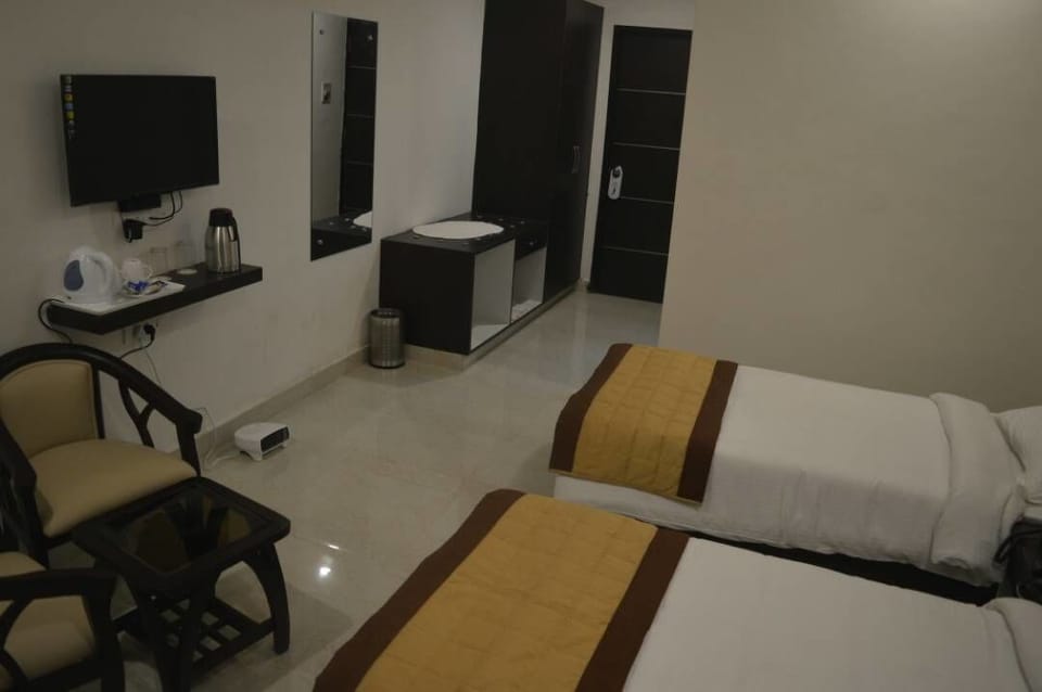 Standard Twin Room, 2 Twin Beds | Blackout drapes, iron/ironing board, bed sheets, wheelchair access