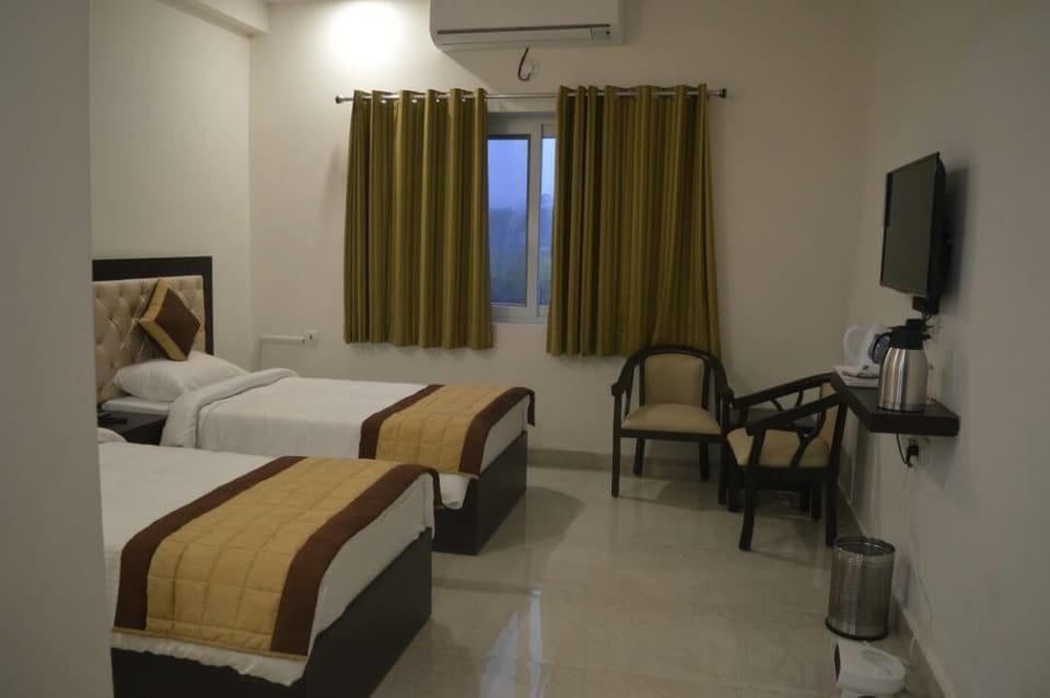 Standard Twin Room, 2 Twin Beds | Blackout drapes, iron/ironing board, bed sheets, wheelchair access