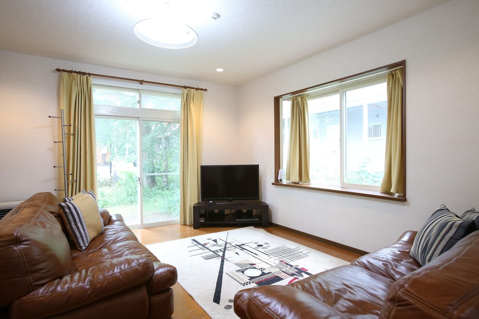 Family House, 4 Bedrooms | Living area | TV