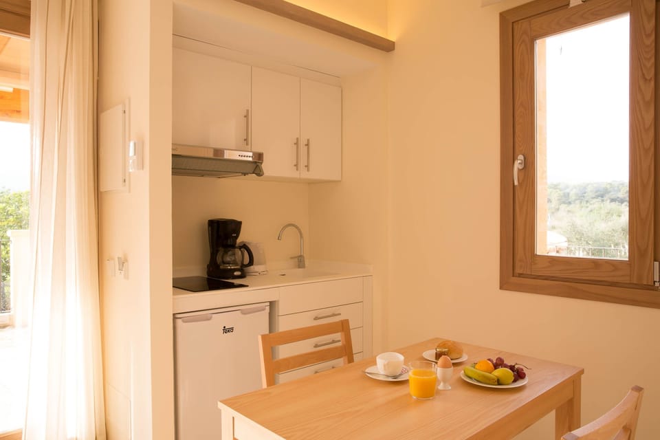 Fridge, stovetop, espresso maker, coffee/tea maker
