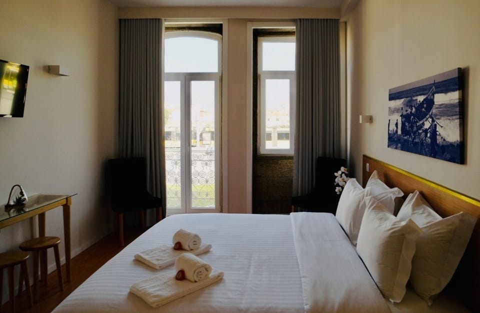 Deluxe Double Room, Balcony | Minibar, soundproofing, cribs/infant beds, free WiFi