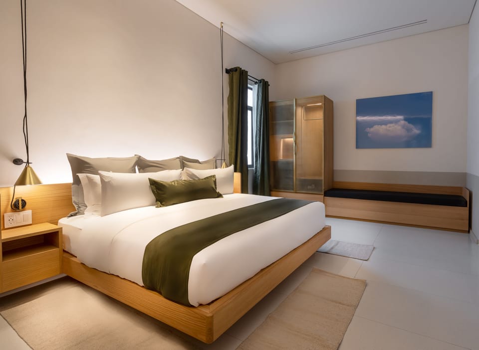 Room, 1 King Bed, Accessible (Roll-In Shower) | Down comforters, in-room safe, individually decorated, desk