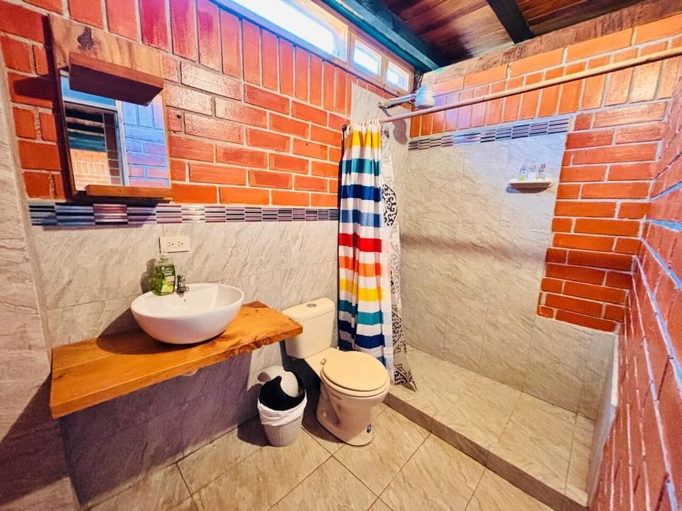 Basic Cottage, 2 Queen Beds | Bathroom | Free toiletries, towels