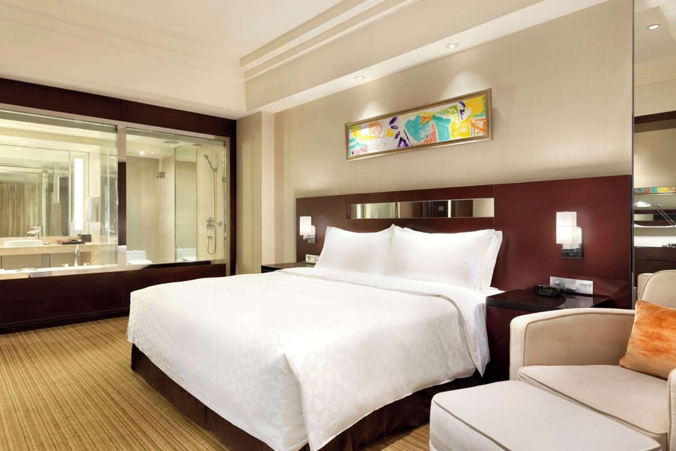 Hypo-allergenic bedding available, pillowtop beds, minibar, in-room safe