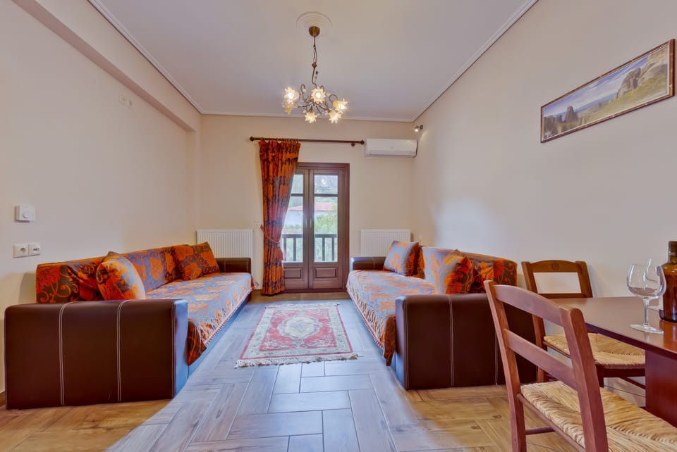 Family Apartment, Balcony (Meteora View) | Living area | 32-cm LED TV with satellite channels, TV, tablet