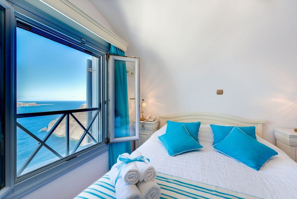 Deluxe Duplex, Hot Tub, Sea View | Minibar, in-room safe, individually decorated, individually furnished
