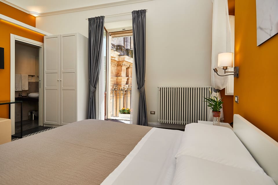 Deluxe Double Room, City View | Individually furnished, desk, blackout drapes, soundproofing
