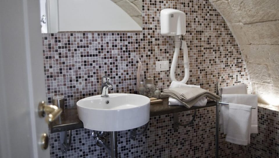 Family Room | Bathroom | Designer toiletries, hair dryer, bathrobes, bidet