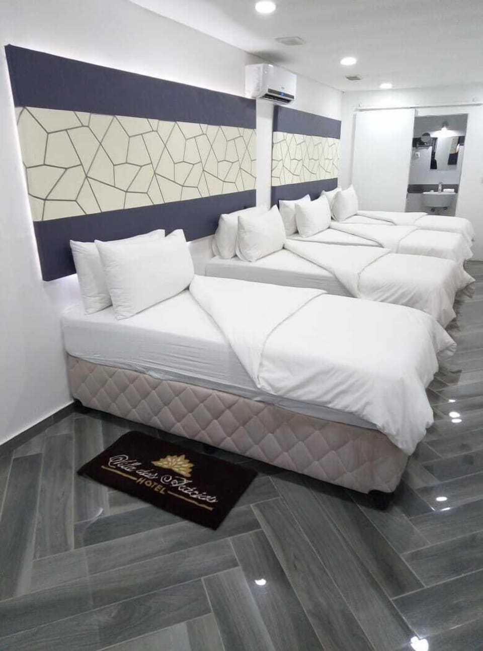 Family Quadruple Room | Minibar, in-room safe, desk, iron/ironing board
