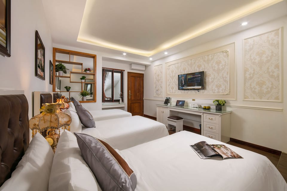 Executive Triple Room, Non Smoking | Down comforters, minibar, in-room safe, desk