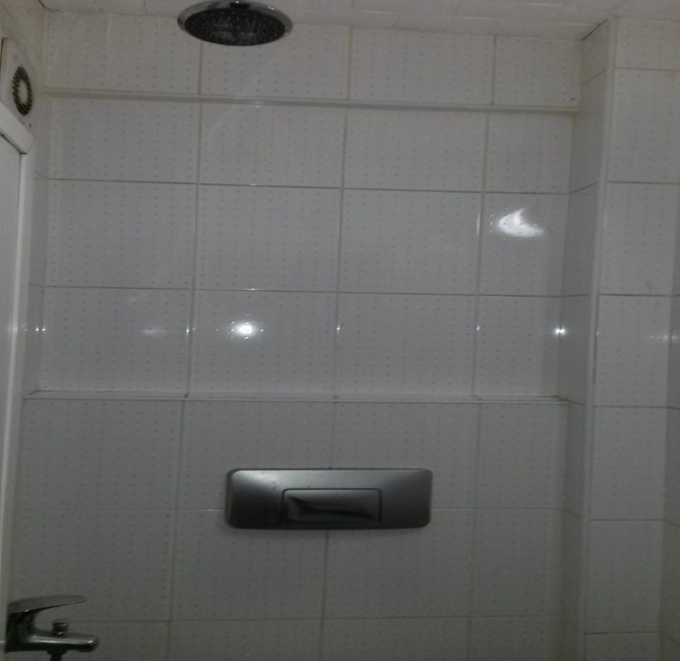Shower, slippers, towels