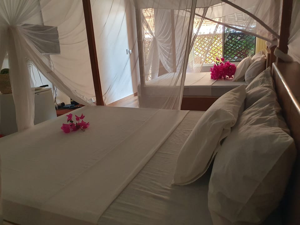 Deluxe Twin Room, 2 Double Beds | In-room safe, individually furnished, desk, laptop workspace