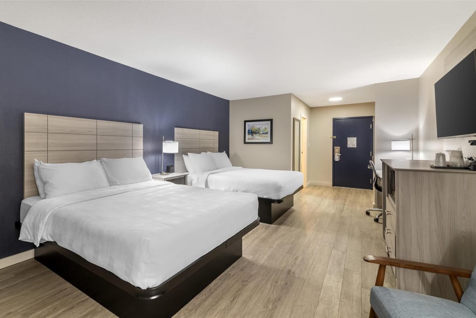 Standard Room, 2 Queen Beds, Non Smoking (Walk-in Shower;Pet Friendly) | Desk, laptop workspace, blackout drapes, iron/ironing board